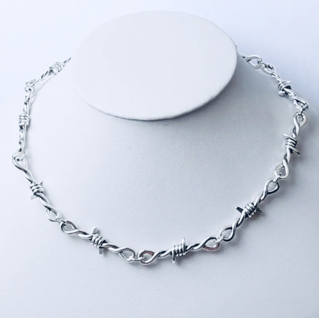 Zamak barbed wire knot necklace