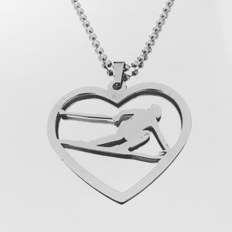 Heart pendant with skier in stainless steel