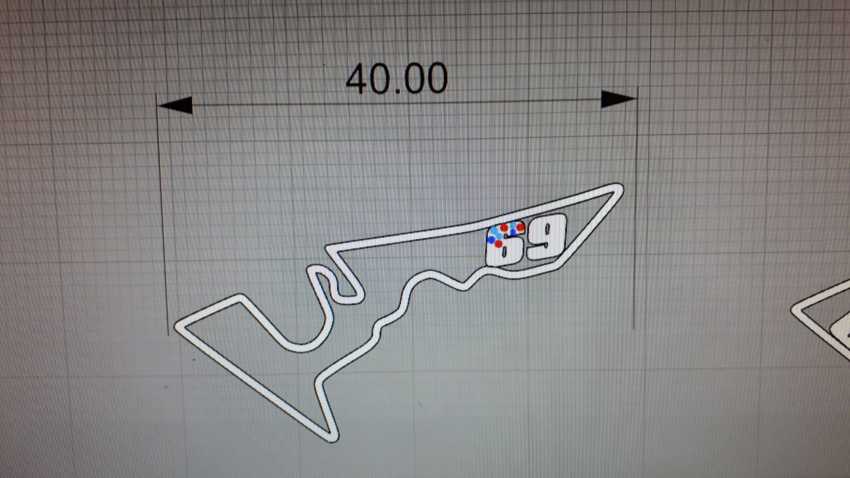 Colgante circuito Austin en plata 925 con el número 69  