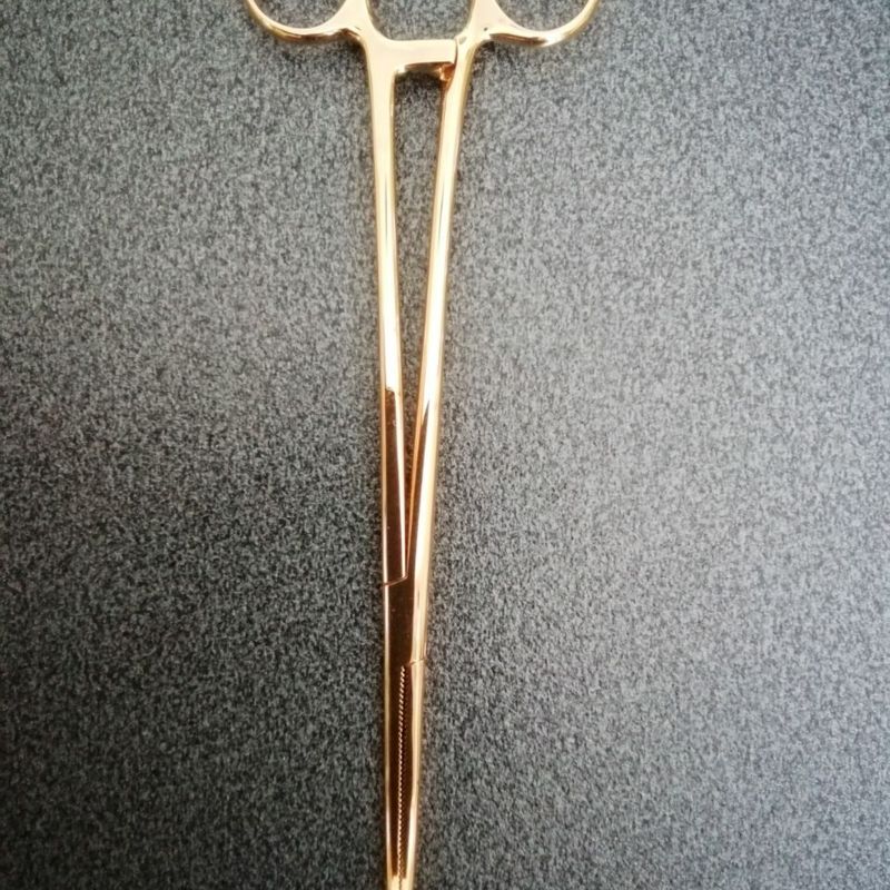 Pinze ginecologiche in oro giallo 750