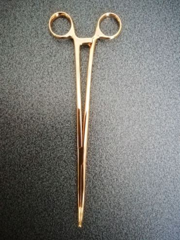Pinze ginecologiche in oro giallo 750