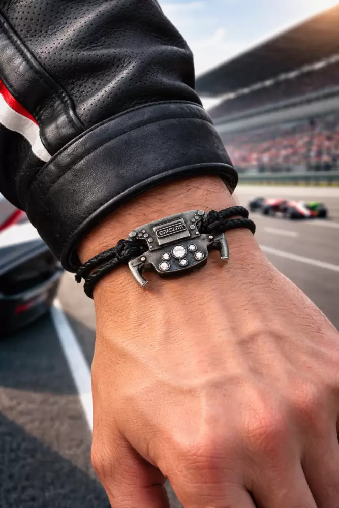 Elegante e sportivo Bracciale Racing Volante F1 in bronzo brunito e zirconi  