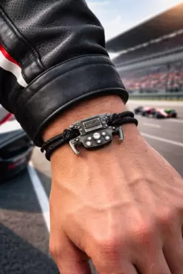 Elegante e sportivo Bracciale Racing Volante F1 in bronzo brunito e zirconi 