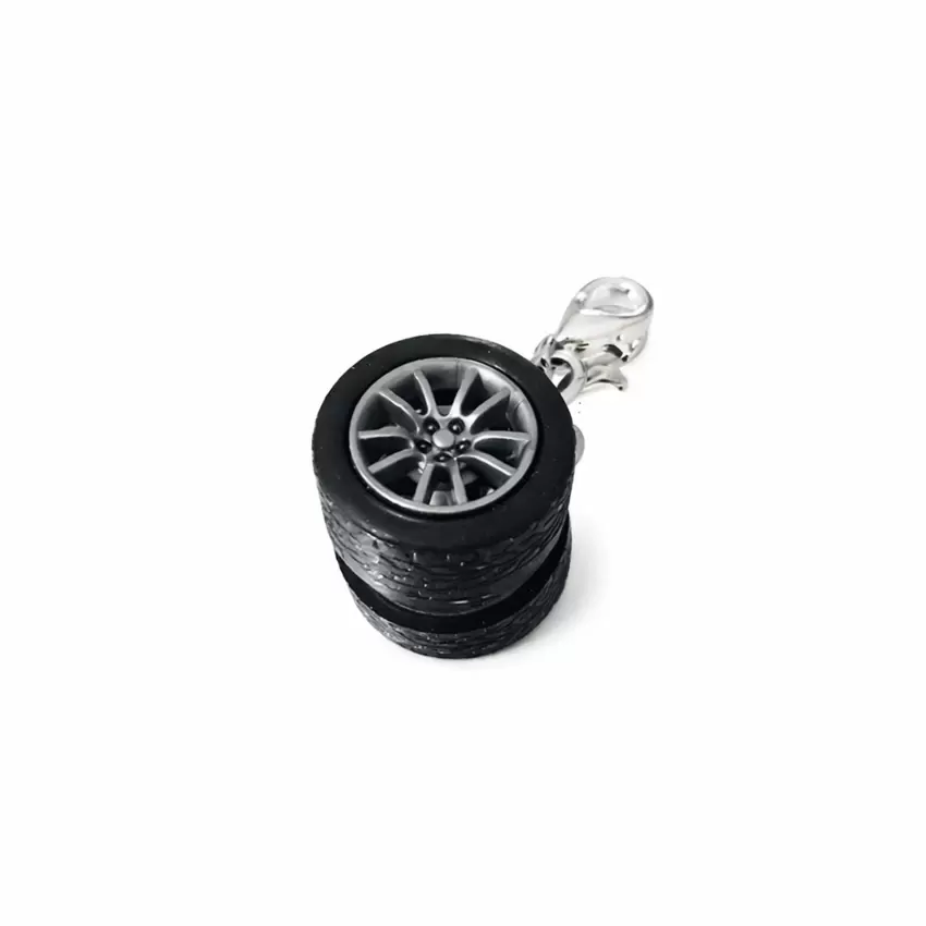 Racing Charm con moschettone e pneumatico   