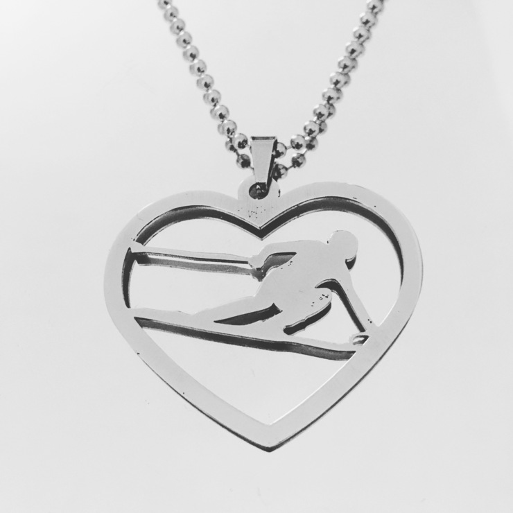 Pendentif coeur avec skieur en acier 