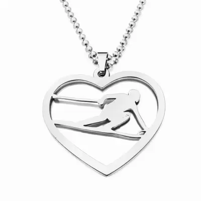 Ciondolo cuore con sciatrice personalizzabile in acciaio lucido 