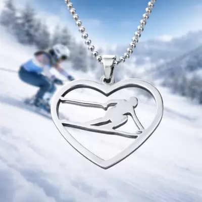 Ciondolo cuore con sciatrice personalizzabile in acciaio lucido 