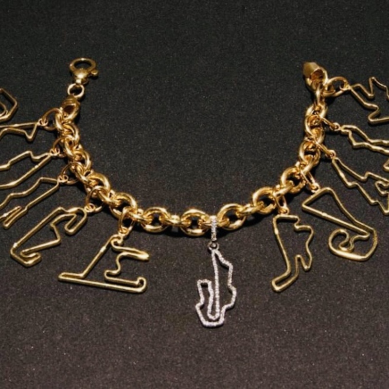 Bracciale charms “World Champion” in oro 750 