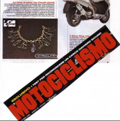 Pulsera con charms “World Champion”  en oro 750. 