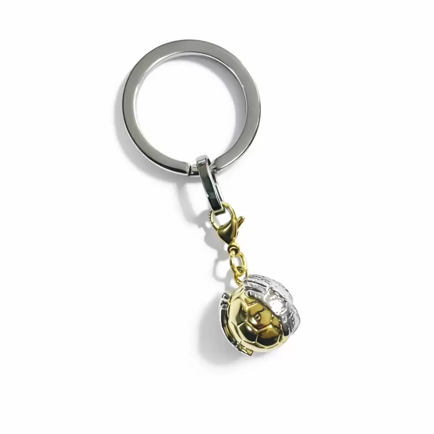Schlüsselanhänger mit Stahlball und Torwarthandschuhen  