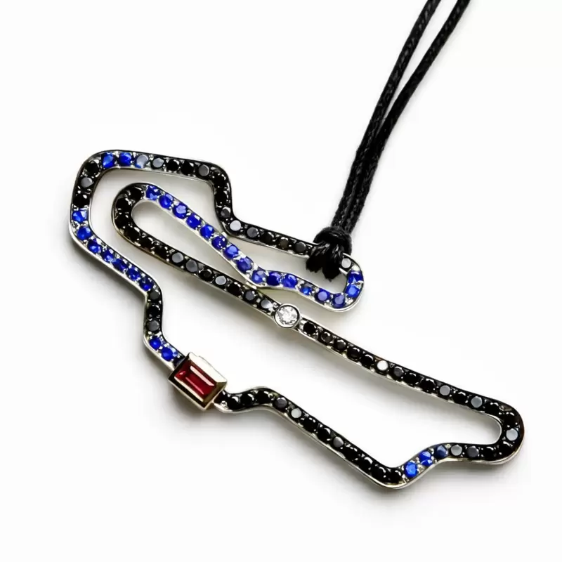 Colgante circuito de Mugello en oro 750, zafiros y diamantes negros