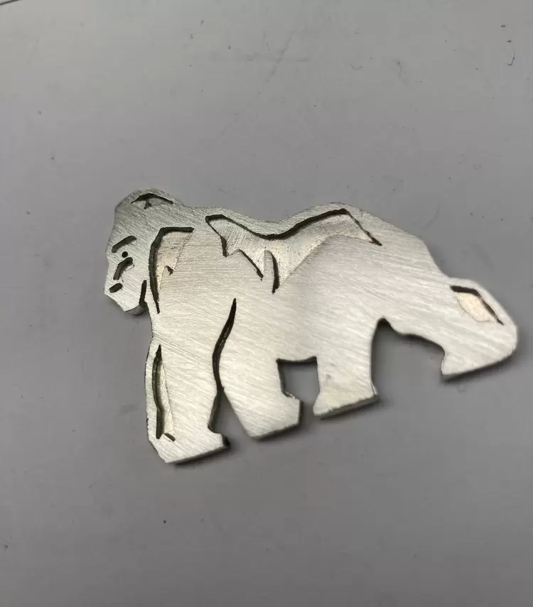 Gorilla-Anhänger aus 750er Gelbgold, schwarzes Emaille, MK-Initialen in Diamantbesatz  