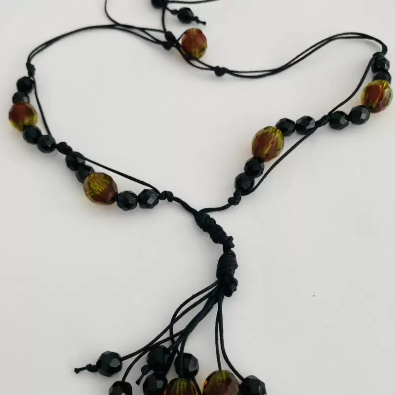 Collana in cristallo nero,murrine color ambra