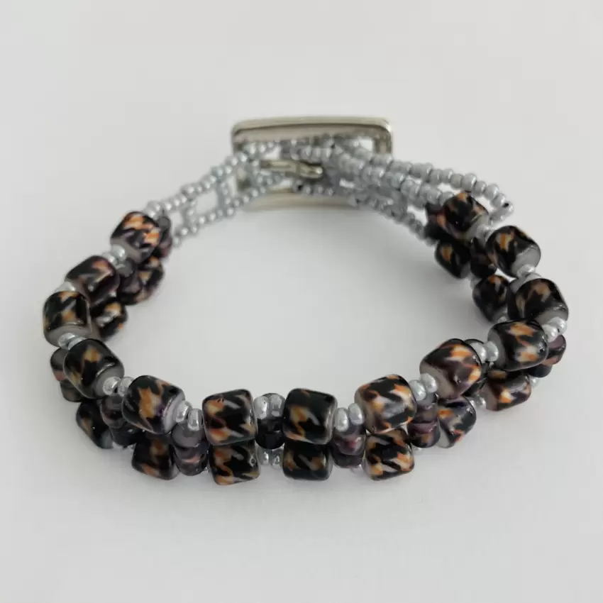 Pulsera murrina a rayas ámbar-negro  