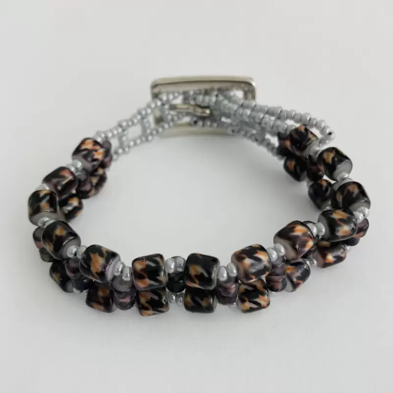 Braccialetto murrine striate color ambra-nero