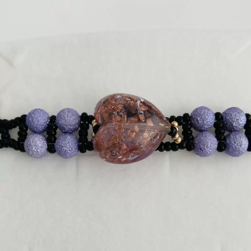 Braccialetto con murrina centrale a cuore foglia oro