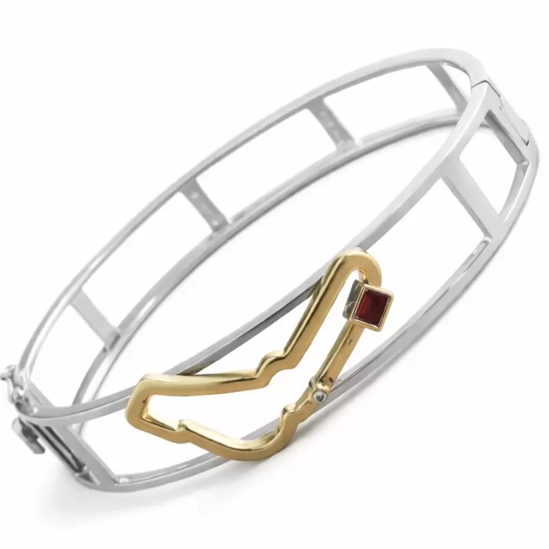 Bracciale rigido in oro bianco e giallo 750 con circuito di Monza 