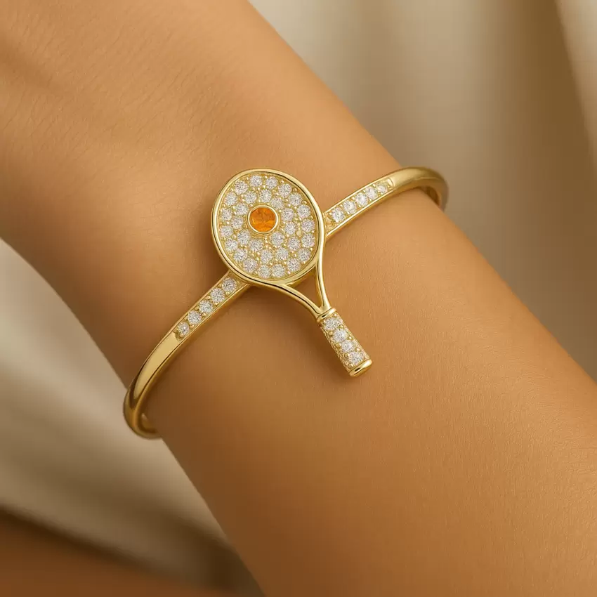 Tennis racket bracelet in 18kt yellow gold diamonds and orange sapphire  