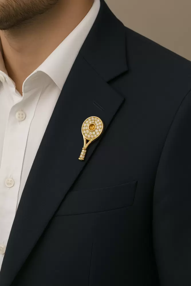 Tennis racket jacket pin in 18kt gold diamonds and sapphire orange  