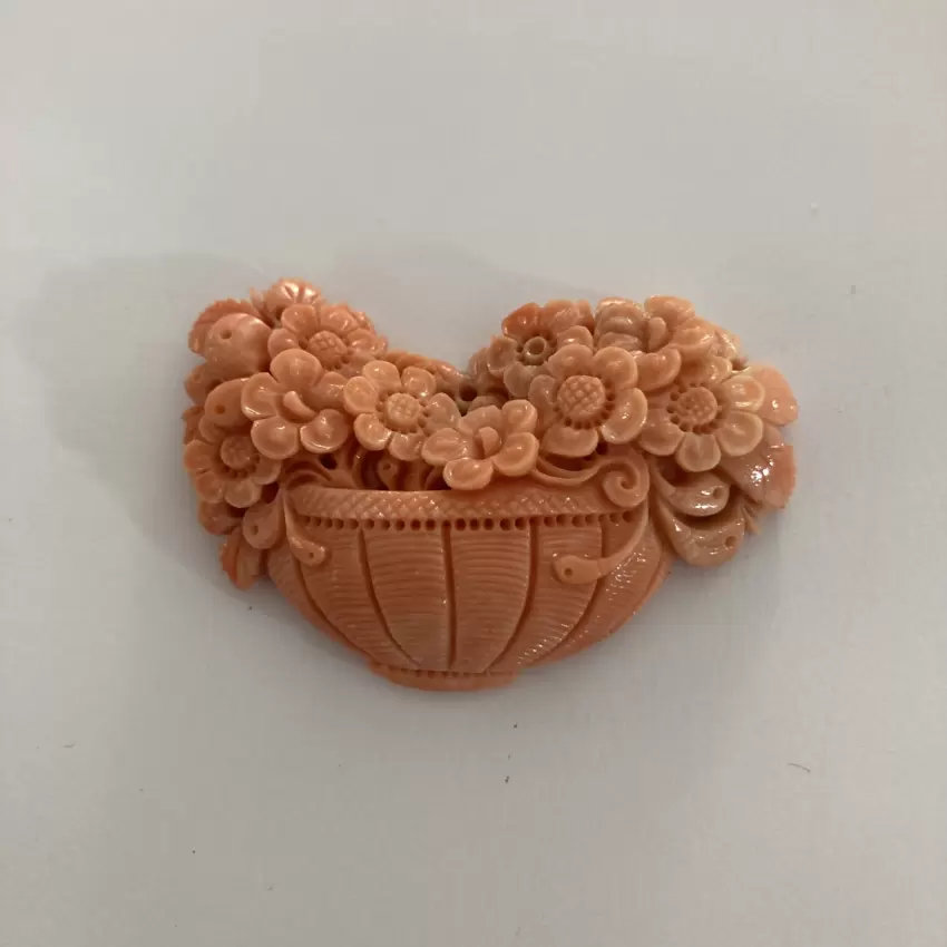 Coral engraved with floral subject  
