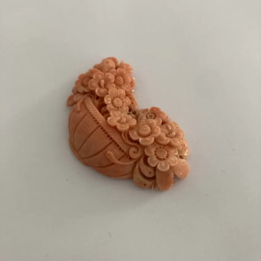 Coral engraved with floral subject  