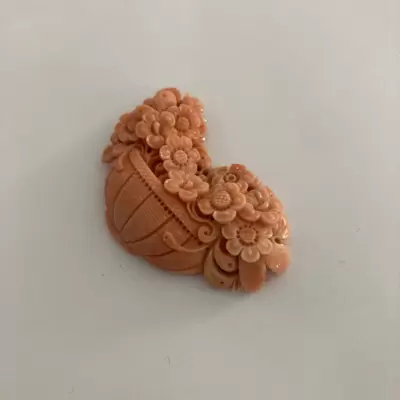 Coral engraved with floral subject 