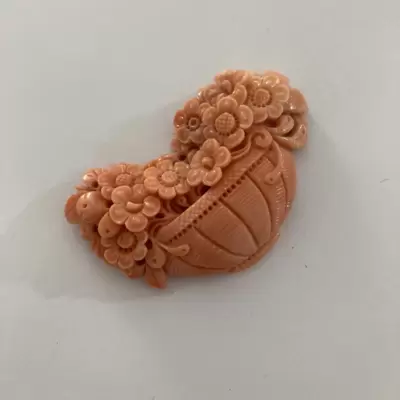 Coral engraved with floral subject 
