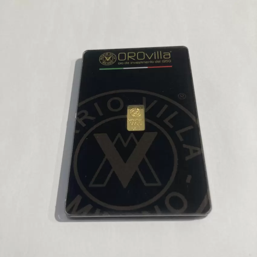 Patented triangle pendant in 18kt gold with Mario Villa ingot in 999.9 gold  