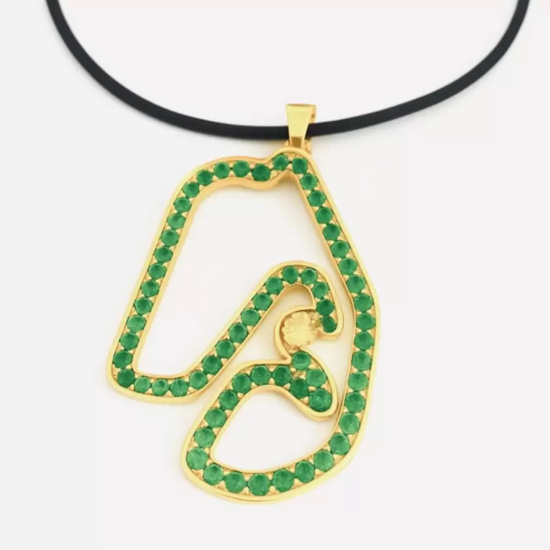Interlagos circuit pendant in 18kt yellow gold and natural emeralds